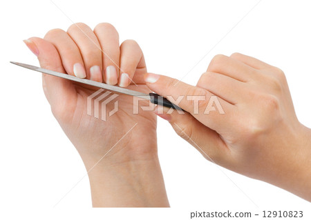Hands and manicure nail file 12910823