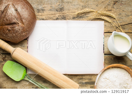 Cookbook with baking ingredients Cookbook with baking ingredients 12911917