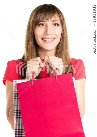 Dreaming happy young woman with shopping bag 12911932