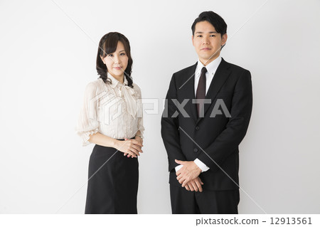 Business man and woman 12913561