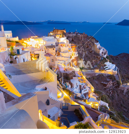 Oia village on Santorini in sunset, Greece. Oia village on Santorini in sunset, Greece. 12913923