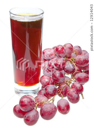 Grape cluster and juice in glass Grape cluster and juice in glass 12914043