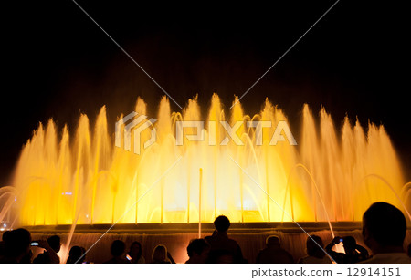 Night view of Magic Fountain light show in Barcelona, Spain 12914151