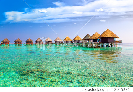 Island in ocean, overwater villas 12915285