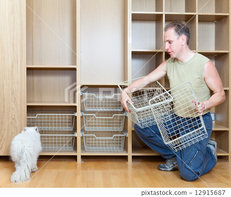 New wardrobe in a new building - by tradition the first start a cat 12915687