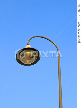 street light against a blue sky street light against a blue sky 12916182