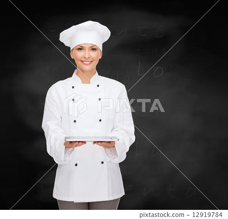 smiling female chef with tablet pc computer 12919784