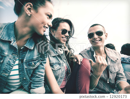 group of teenagers hanging out 12920173