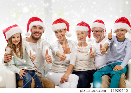 happy family sitting on couch at home happy family sitting on couch at home 12920440