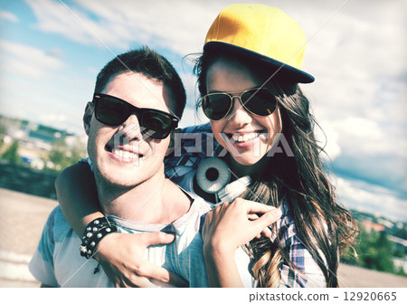 teenagers having fun outside 12920665
