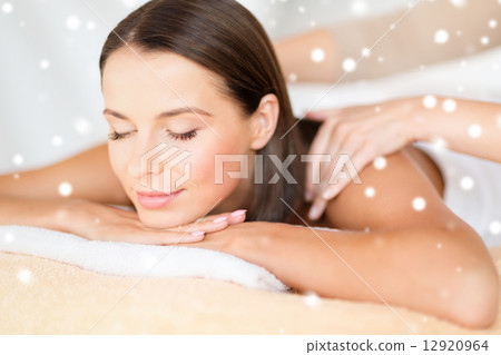 beautiful young woman in spa salon getting massage beautiful young woman in spa salon getting massage 12920964