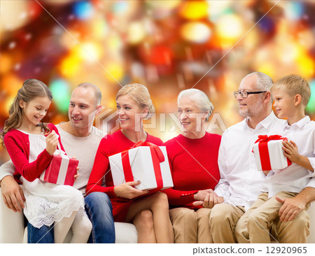 smiling family with gifts smiling family with gifts 12920965
