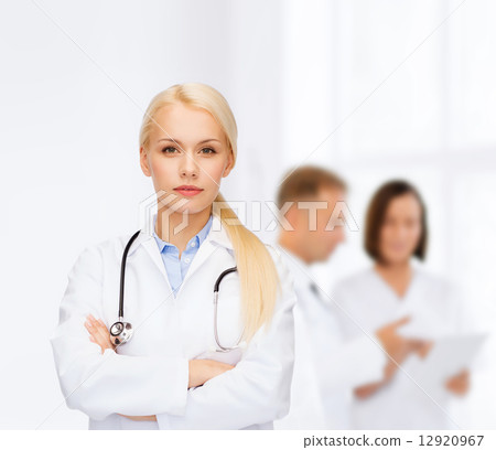 serious female doctor with stethoscope 12920967