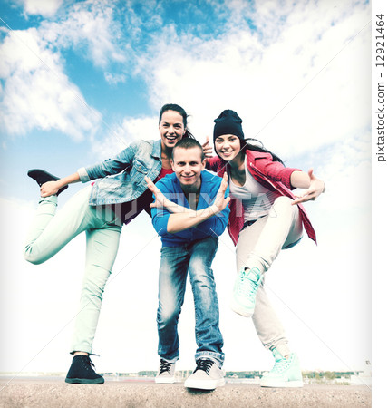 group of teenagers dancing group of teenagers dancing 12921464