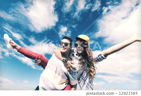 teenagers having fun outside 12921565