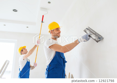 group of builders with tools indoors group of builders with tools indoors 12921798