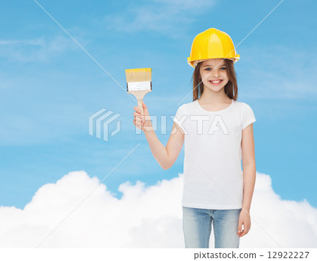 smiling little girl in helmet with paint brush smiling little girl in helmet with paint brush 12922227