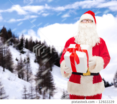 man in costume of santa claus with gift box man in costume of santa claus with gift box 12922229