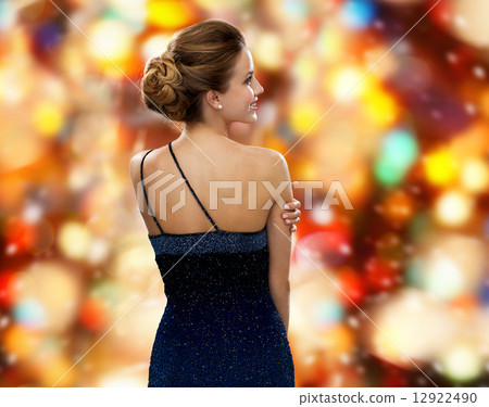 smiling woman in evening dress smiling woman in evening dress 12922490