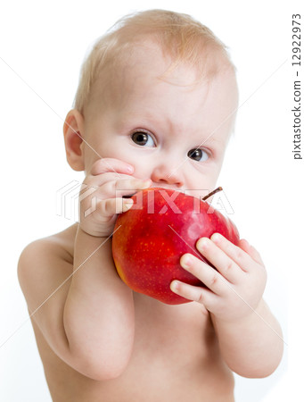 Baby boy eating apple, isolated on white 12922973