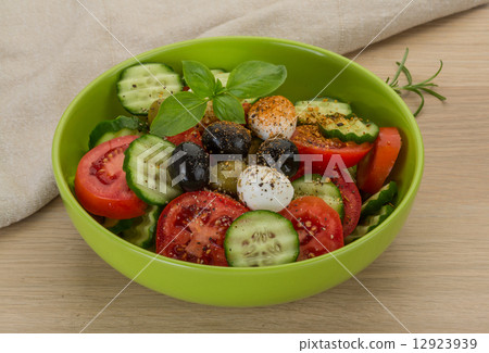 Salad with mozzarella and tomatoes 12923939