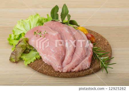 Raw pork schnitzel 12925262