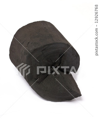 Charcoal made of wood isolated on white. 12926768