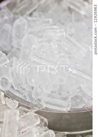 Ice in metallic bowl. Ice in metallic bowl. 12926963
