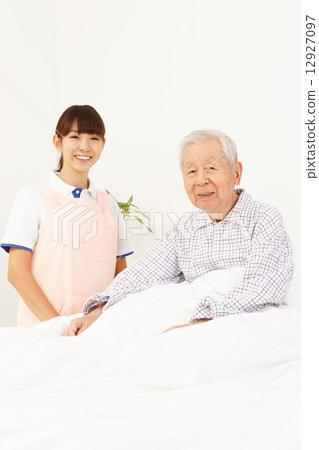 Caregiver and old man Caregiver and old man 12927097