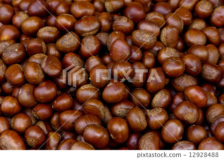 Roasted chestnuts background Roasted chestnuts background 12928488