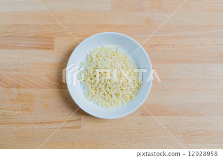 Chopped sweet almonds on wood Chopped sweet almonds on wood 12928958