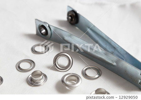 Rivets on light white cloth 12929050
