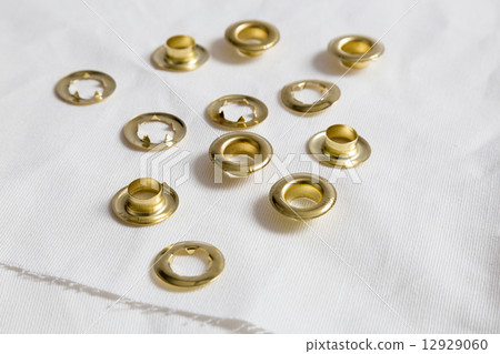 Rivets on light white cloth 12929060