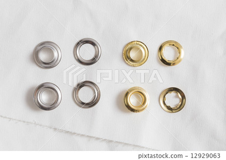 Rivets on light white cloth 12929063