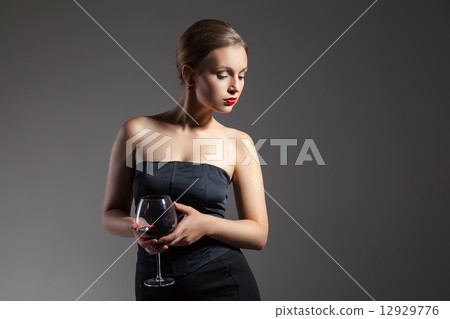 Beautiful woman with wine glass, retro stylization Beautiful woman with wine glass, retro stylization 12929776