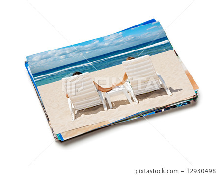 Stack of vacation photos isolated Stack of vacation photos isolated 12930498