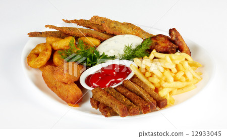 Roasted fish and chicken wings served with french fries and rusk 12933045