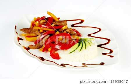Grilled meat with paprica and rice garnish 12933047