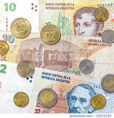 Money from Argentina, peso banknotes and coins. 12933239