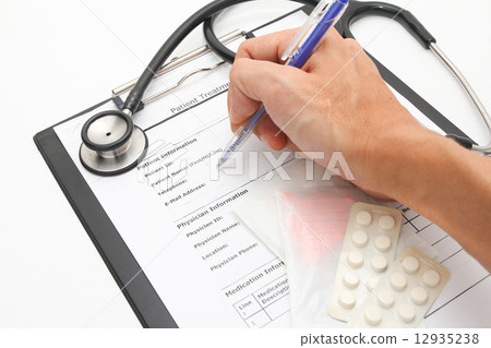 Doctor prescribing medication for patient Doctor prescribing medication for patient 12935238