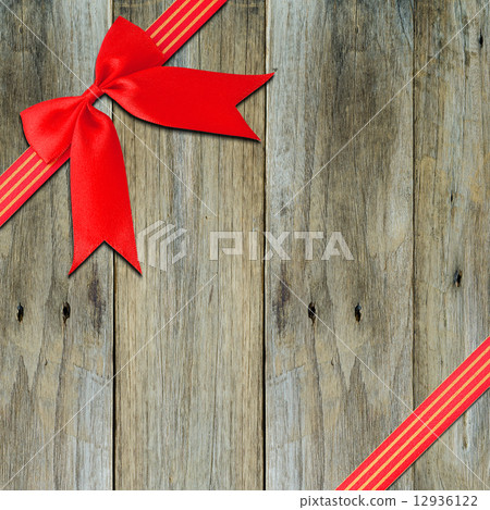 Red ribbon with corner bow Red ribbon with corner bow 12936122