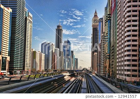 Dubai with Metro and skyscrapers, United Arab Emirates 12941557