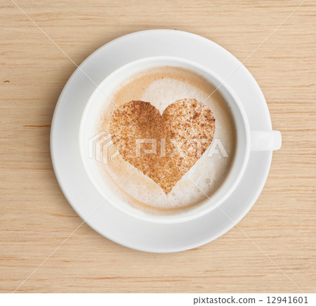 cappuccino coffee cup with foam and heart shape 12941601