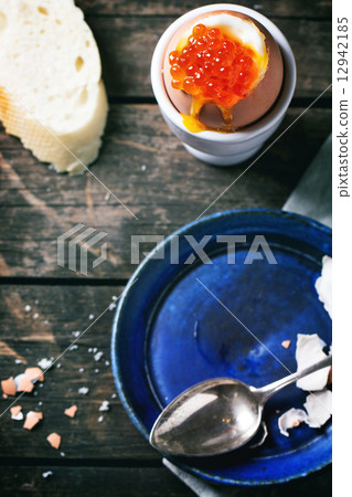 Soft-boiled egg with red caviar Soft-boiled egg with red caviar 12942185