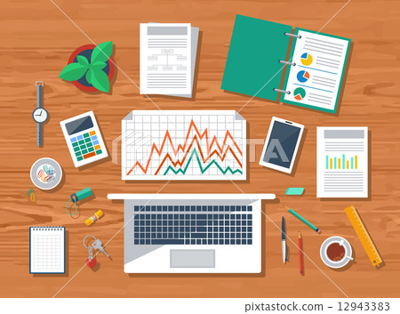 Top view of workplace with laptop and devices Top view of workplace with laptop and devices 12943383