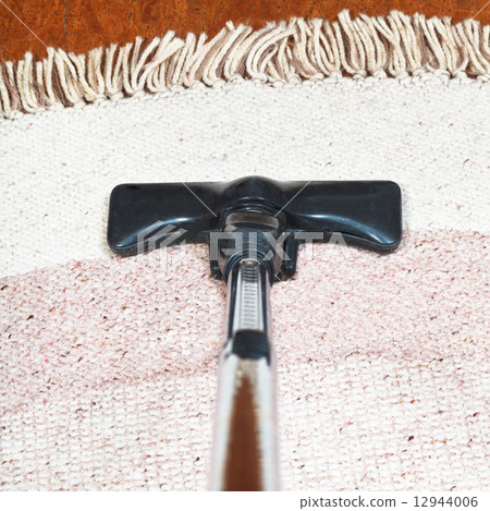 carpet vacuuming with a hoover carpet vacuuming with a hoover 12944006