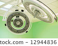 Two turned off surgical lamps in operation surgery room. 12944836