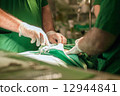 Doctors with tools in hands making surgery in Israel 12944841