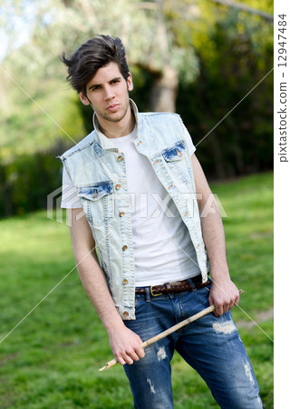Attractive young handsome man, model of fashion Attractive young handsome man, model of fashion 12947484