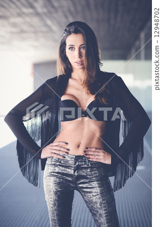 Woman wearing transparent shirt and black bra 12948702